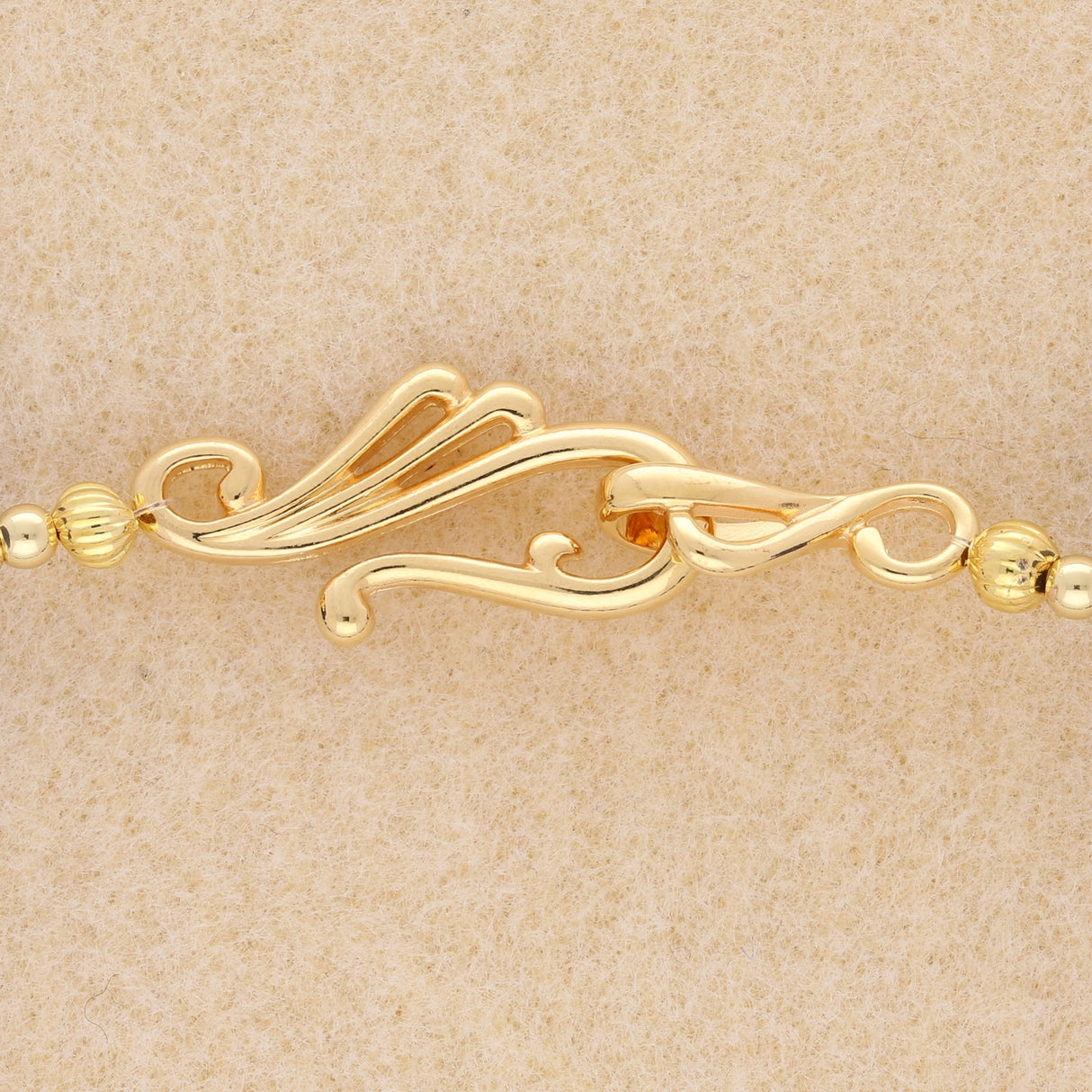 Dekorativer S - Haken Verschluss – goldfarben - PerlineBeads SA