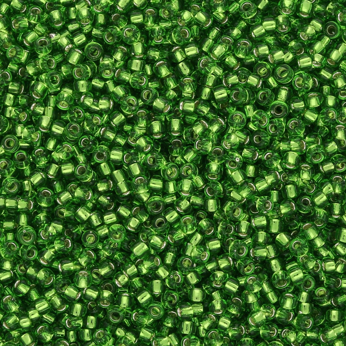 Rocailles - Perlen Toho 15/0 – Silver - Lined Peridot - PerlineBeads SA