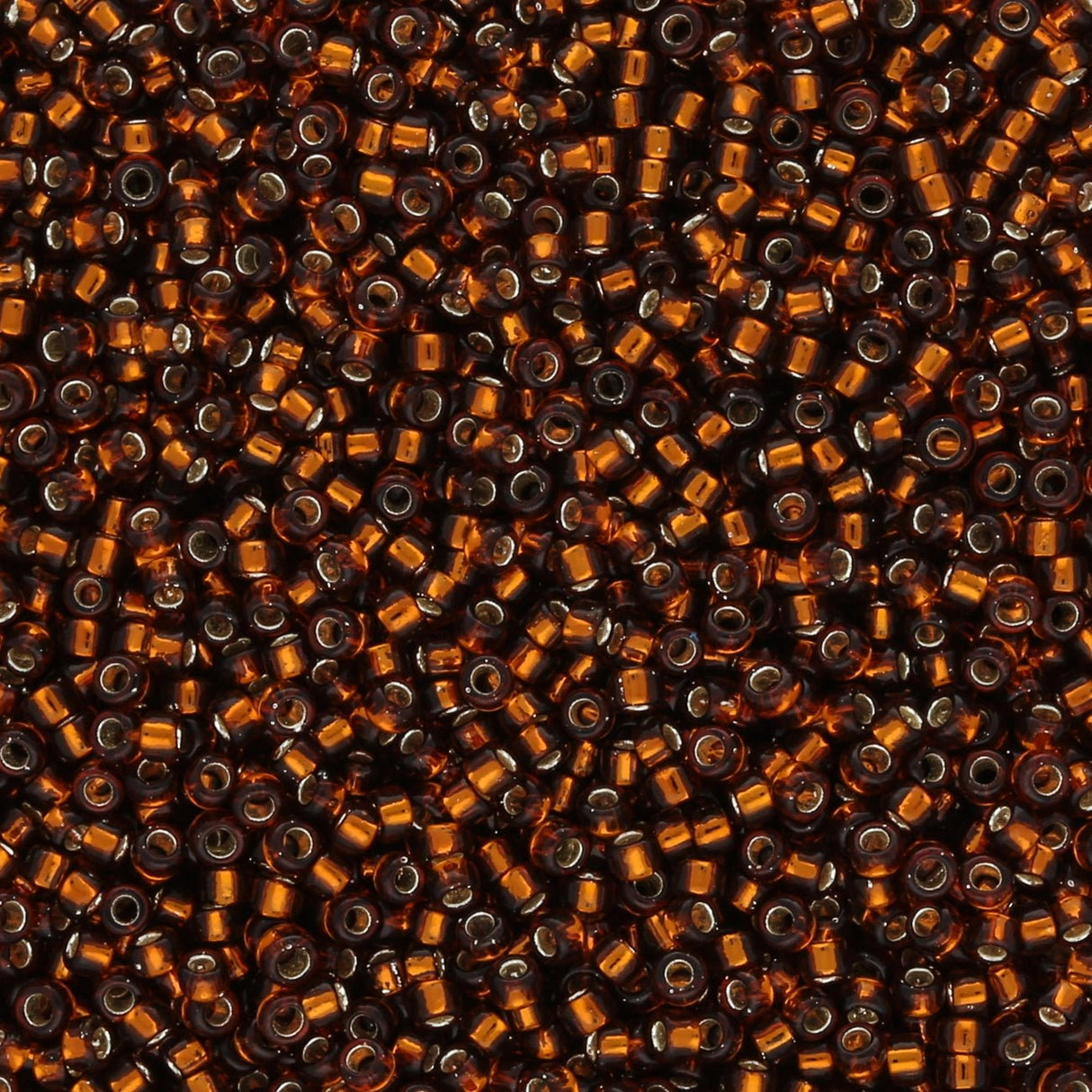 Rocailles - Perlen Toho 15/0 – Silver - Lined Smoky Topaz - PerlineBeads SA