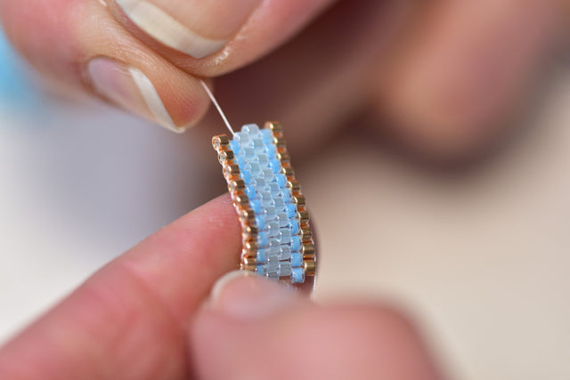 Delica 11/0 - DB239 - Lined Crystal Light Aquamarine - PerlineBeads