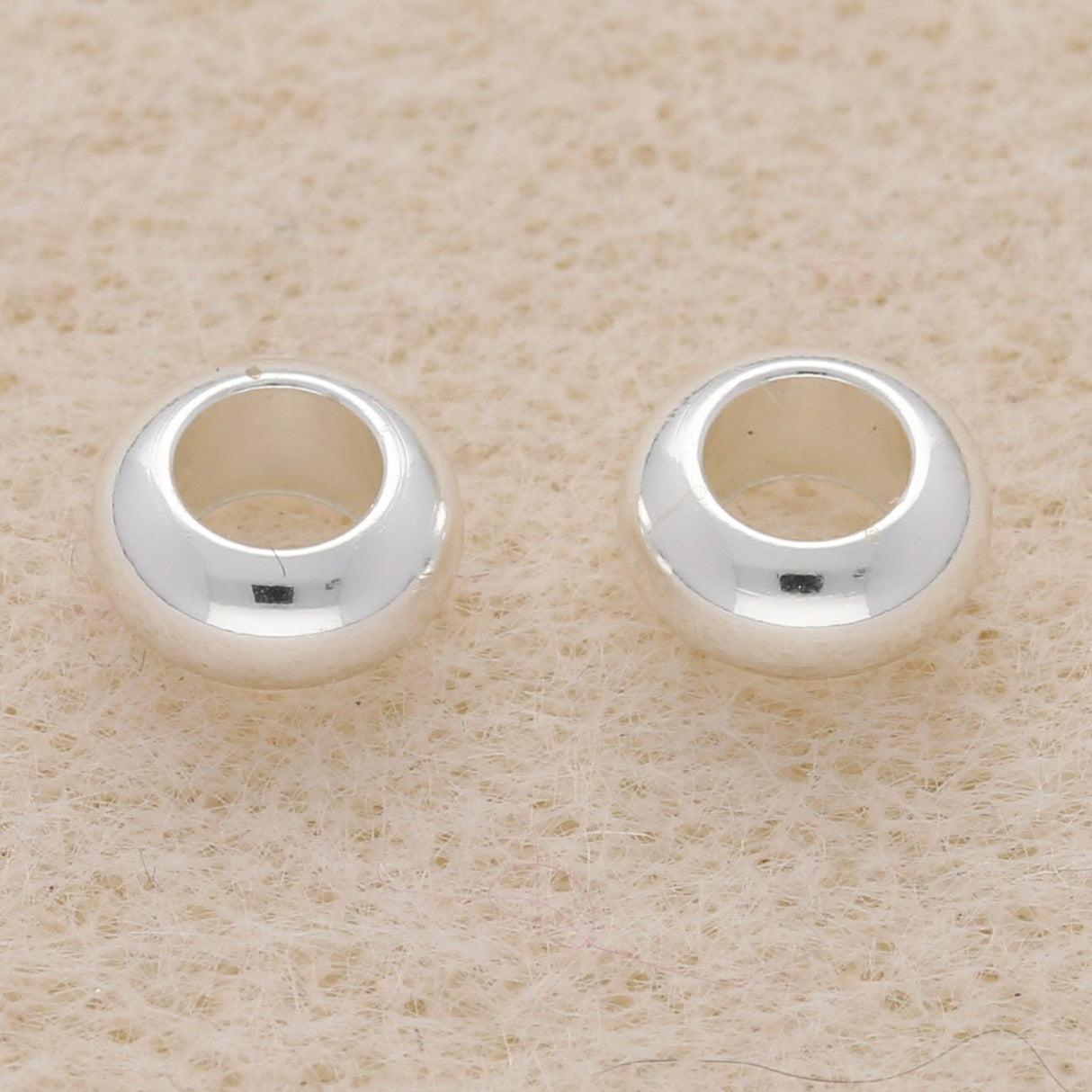 Metallperle rund - 7 x 3 mm - Silber - PerlineBeads