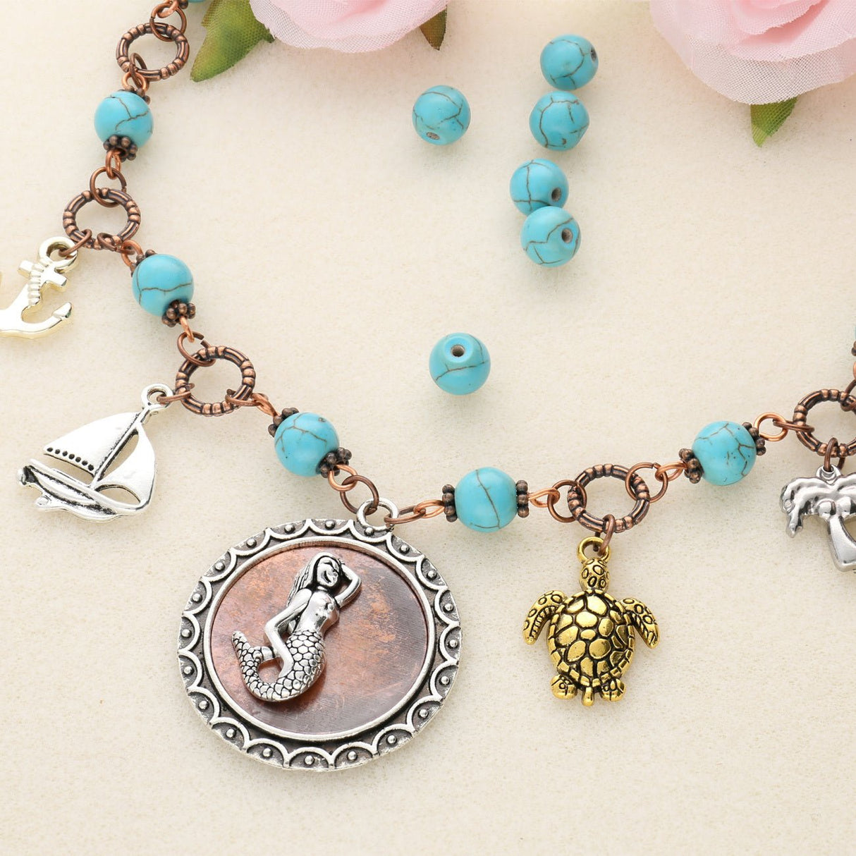 Perle aus synthetischem Türkis - rund – 6 x 5 mm - PerlineBeads