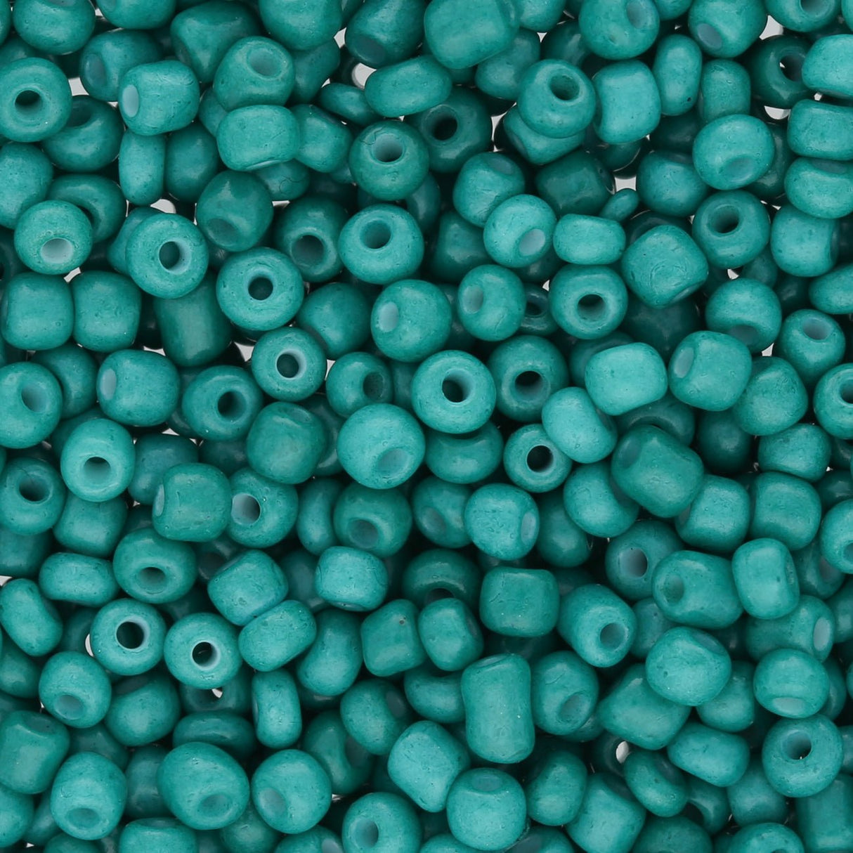 Rocailles Glasperlen 3 mm unregelmässige Grösse – Opaque Teal - PerlineBeads