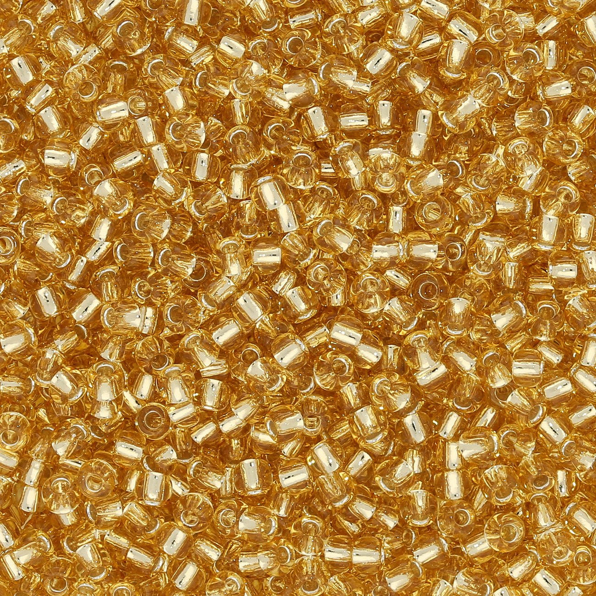Rocailles-Perlen Toho 11/0 – Silver-Lined Light Topaz - PerlineBeads
