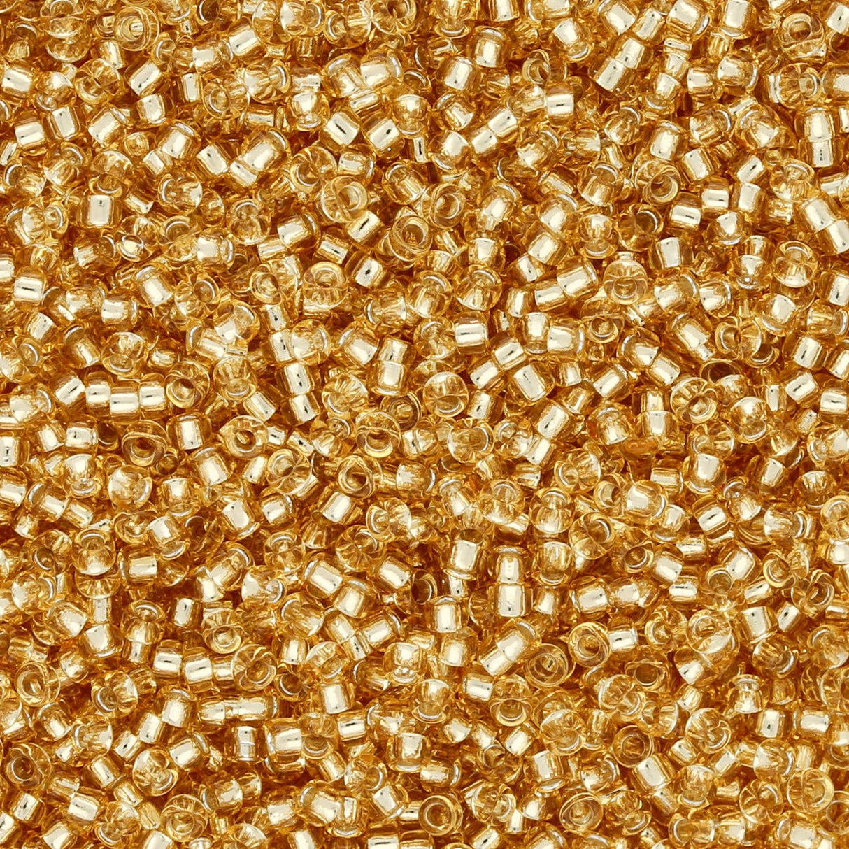 Rocailles-Perlen Toho 15/0 – Silver-Lined Light Topaz - PerlineBeads