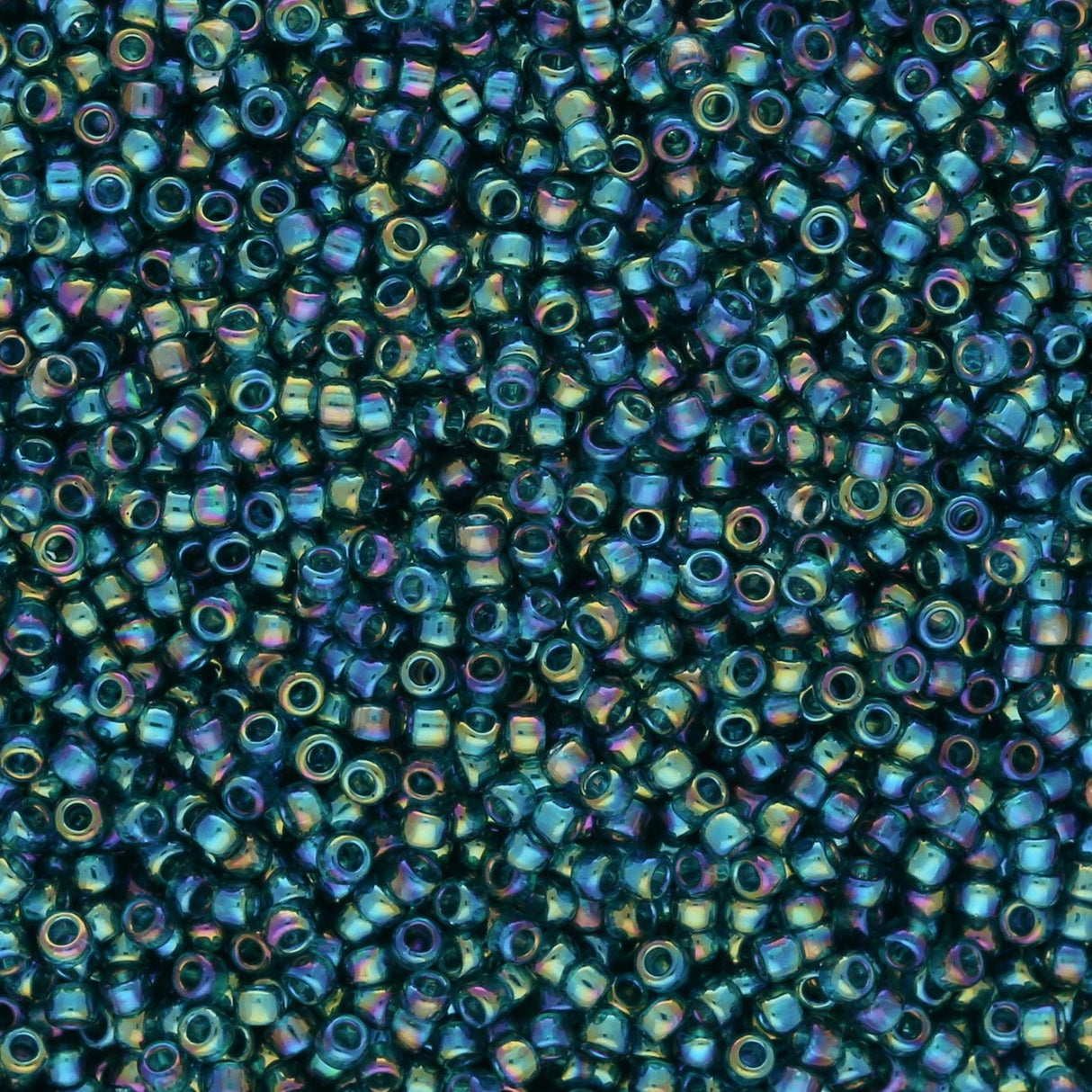Rocailles-Perlen Toho 15/0 – Transparent Rainbow Teal - PerlineBeads