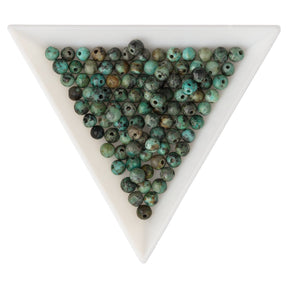 Afrikanischer Türkis Perlen · rund · 4 mm - PerlineBeads SA
