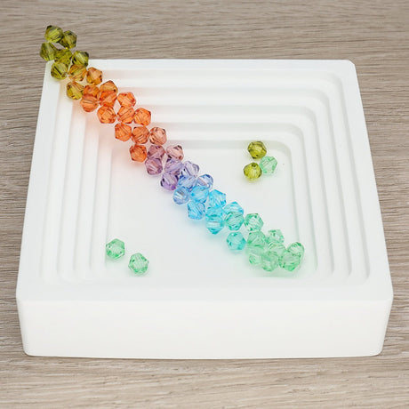 Doppelkegel aus Glas ⋅ 6 mm ⋅ Forest Rainbow - PerlineBeads SA