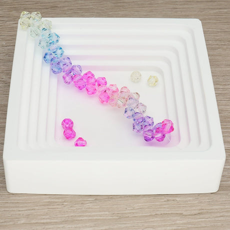 Doppelkegel aus Glas ⋅ 6 mm ⋅ Pastel Splash - PerlineBeads SA
