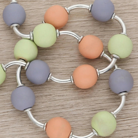 Gebogene Spacer Röhrchen – Silberfarben, 8mm (20 Stück) - PerlineBeads SA