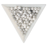 Howlith Perlen · rund · 4 mm - PerlineBeads SA