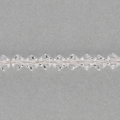 M.C. Doppelkegel 4 mm - Crystal - PerlineBeads SA