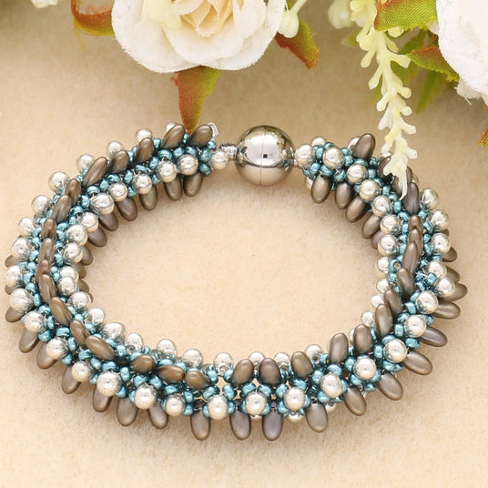 Rizo Glasperlen - 2,5 x 6 mm - Metallic Zinc Iris - PerlineBeads SA