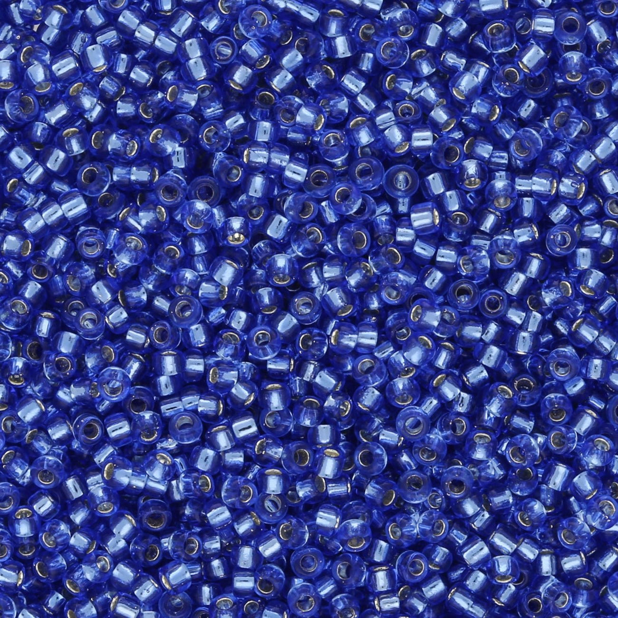 Rocailles - Perlen Toho 15/0 – Silver - Lined Sapphire - PerlineBeads SA