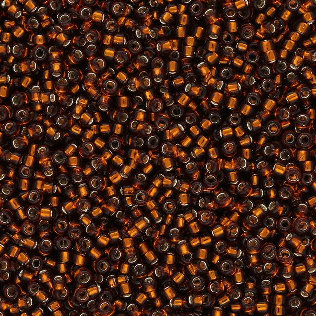 Rocailles - Perlen Toho 15/0 – Silver - Lined Smoky Topaz - PerlineBeads SA