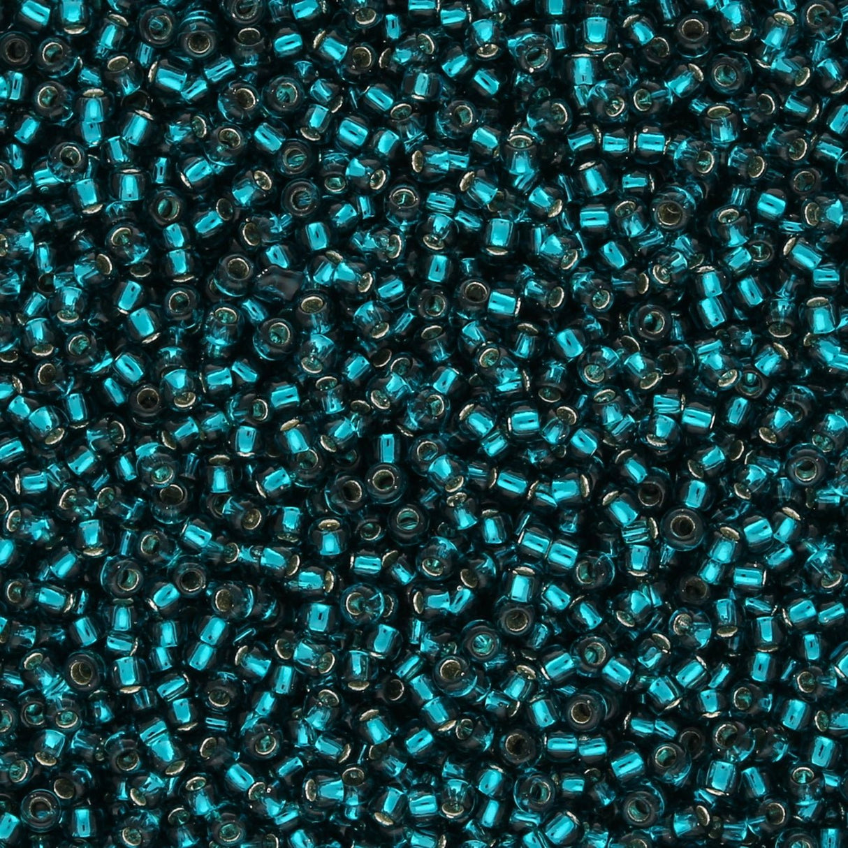 Rocailles - Perlen Toho 15/0 – Silver - Lined Teal - PerlineBeads SA