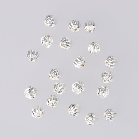 Runde gewellte Metallperle ∅ ca. 4 mm - Versilbert (20 Stk.) - PerlineBeads SA