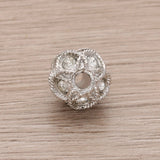 Runde Metallperle 10 mm rhodiniert mit 15 Swarovski® Kristalle - PerlineBeads SA