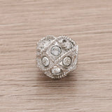 Runde Metallperle 10 mm rhodiniert mit 15 Swarovski® Kristalle - PerlineBeads SA