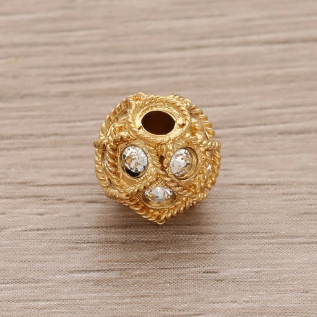 Runde Metallperle 10 mm vergoldet mit 15 Swarovski® Kristalle - PerlineBeads SA