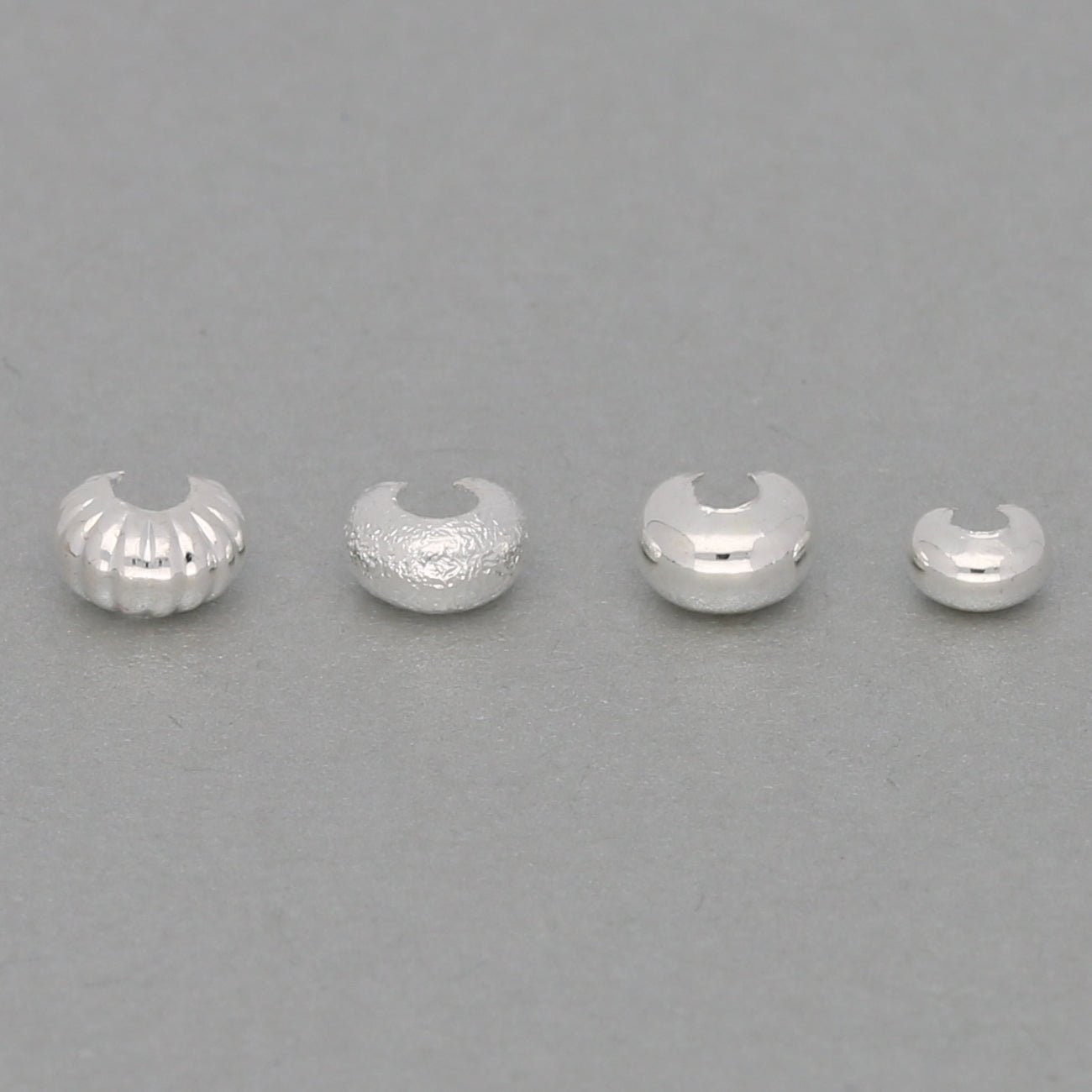 Kaschierperle versilbert sortiert - PerlineBeads