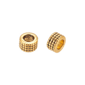 Metallperle im tibetischen Stil 5 x 3 mm - Antikgold - PerlineBeads