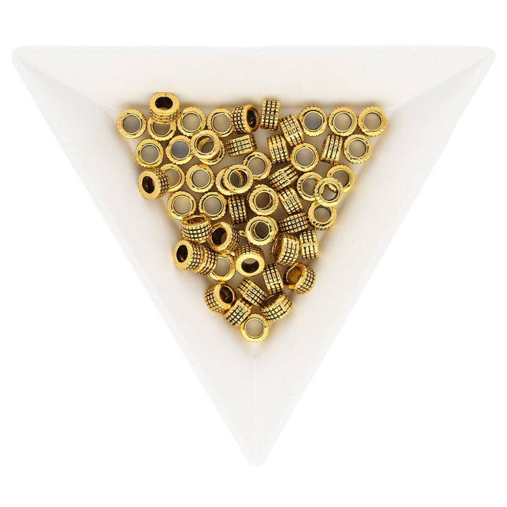 Metallperle im tibetischen Stil 5 x 3 mm - Antikgold - PerlineBeads