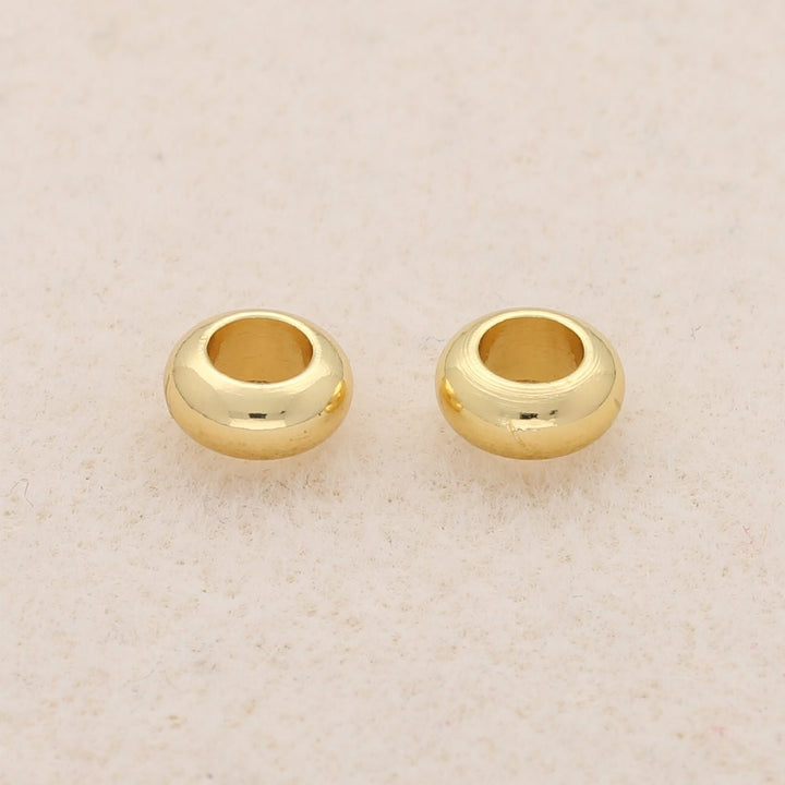 Metallperle rund - 7 x 3 mm - Gold - PerlineBeads