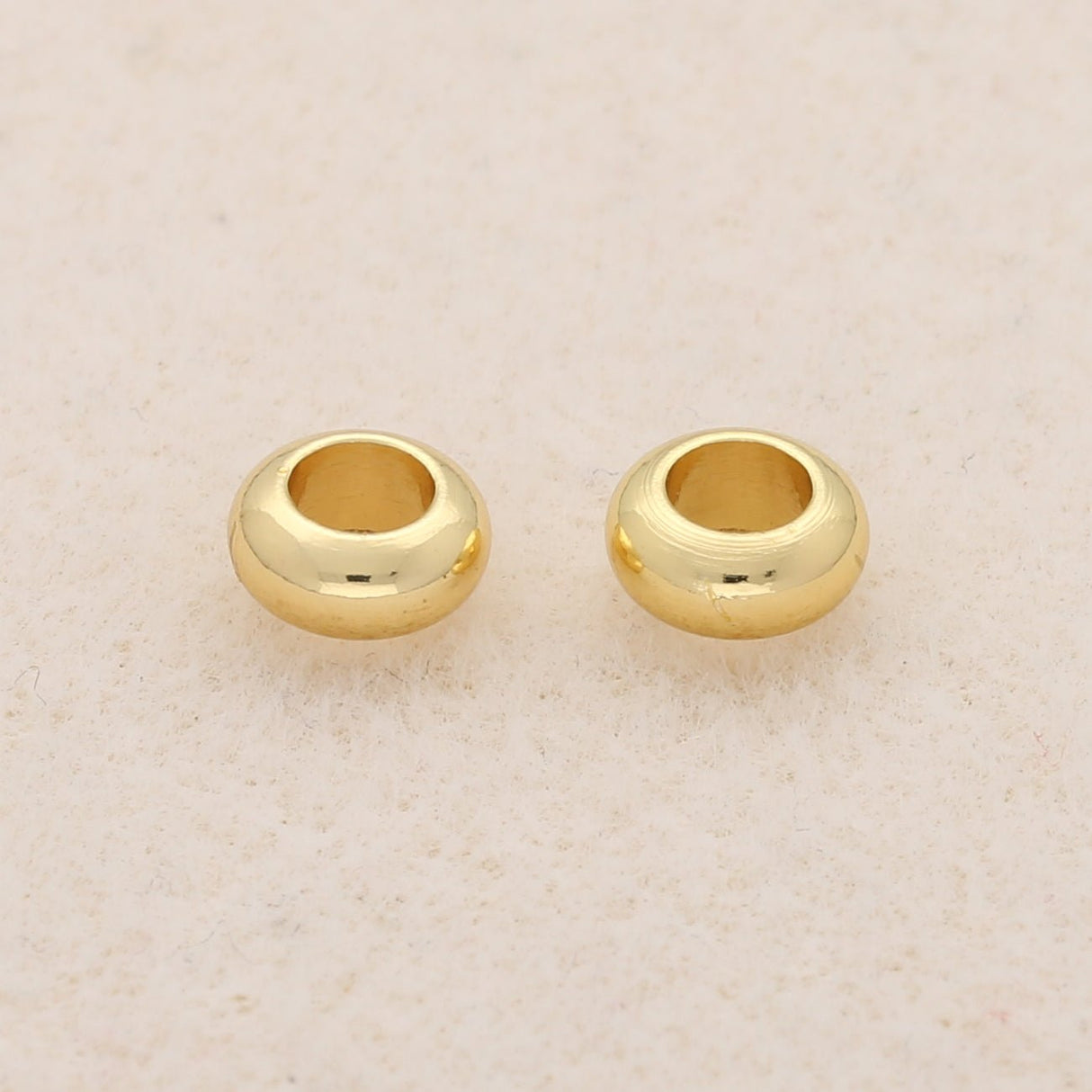 Metallperle rund - 7 x 3 mm - Gold - PerlineBeads