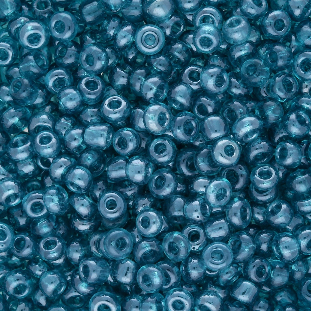 Rocailles Glasperlen 3 mm unregelmässige Grösse – Transparent Lustered Sky Blue - PerlineBeads