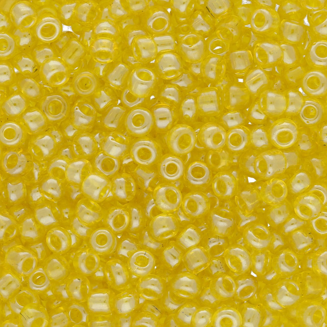 Rocailles Glasperlen 3 mm unregelmässige Grösse – Transparent Lustered Yellow - PerlineBeads