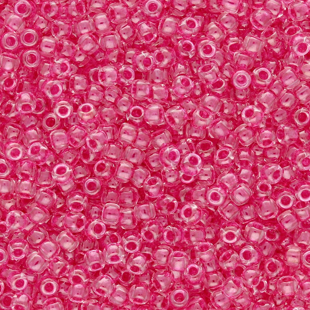 Rocailles-Perlen Toho 11/0 – Inside color Crystal/Fuchsia-Lined - PerlineBeads