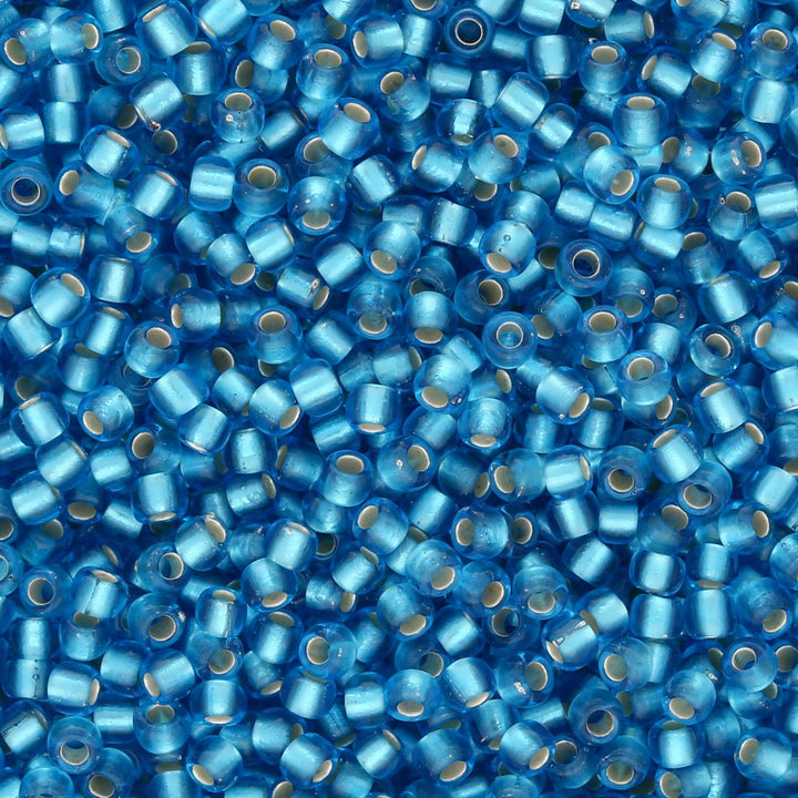 Rocailles-Perlen Toho 11/0 – Silver-Lined Frosted Dark Aqua - PerlineBeads