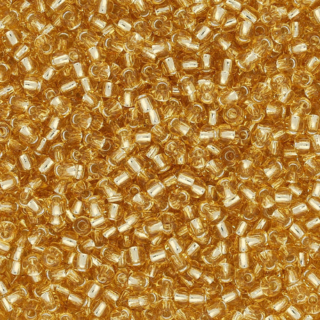 Rocailles-Perlen Toho 11/0 – Silver-Lined Light Topaz - PerlineBeads