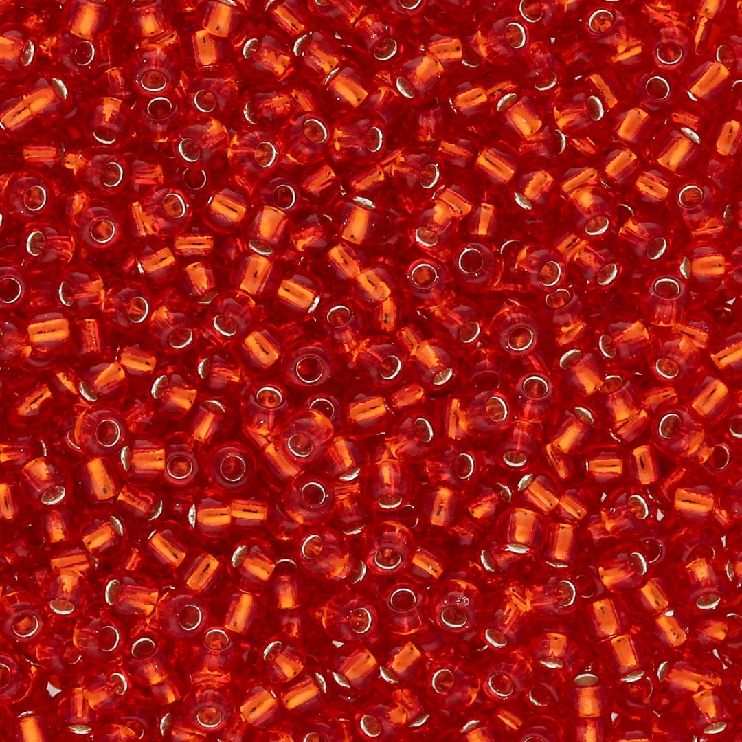 Rocailles-Perlen Toho 11/0 – Silver-Lined Siam Ruby - PerlineBeads