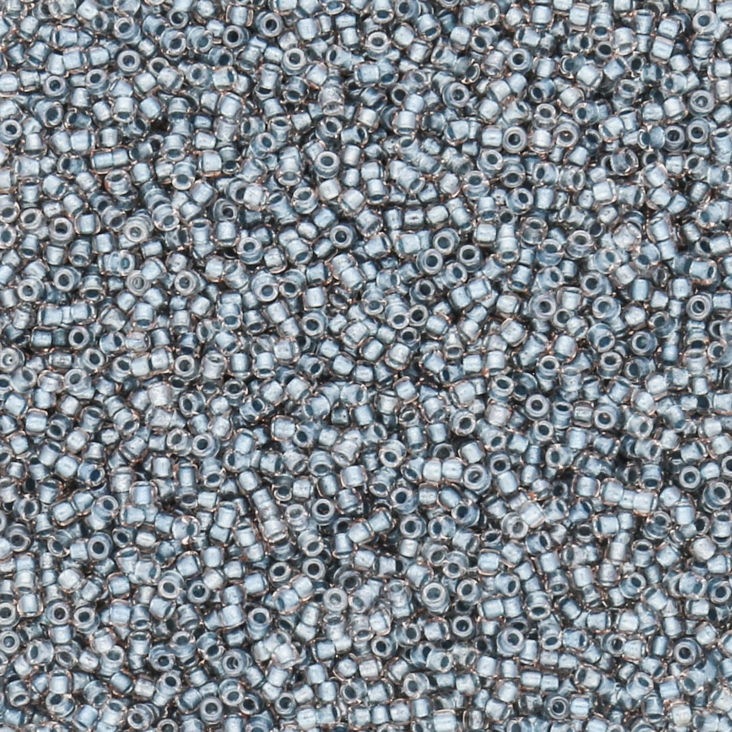 Rocailles-Perlen Toho 15/0 – Inside-Color Crystal/Metallic Blue-Lined - PerlineBeads