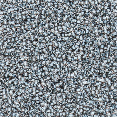 Rocailles-Perlen Toho 15/0 – Inside-Color Crystal/Metallic Blue-Lined - PerlineBeads