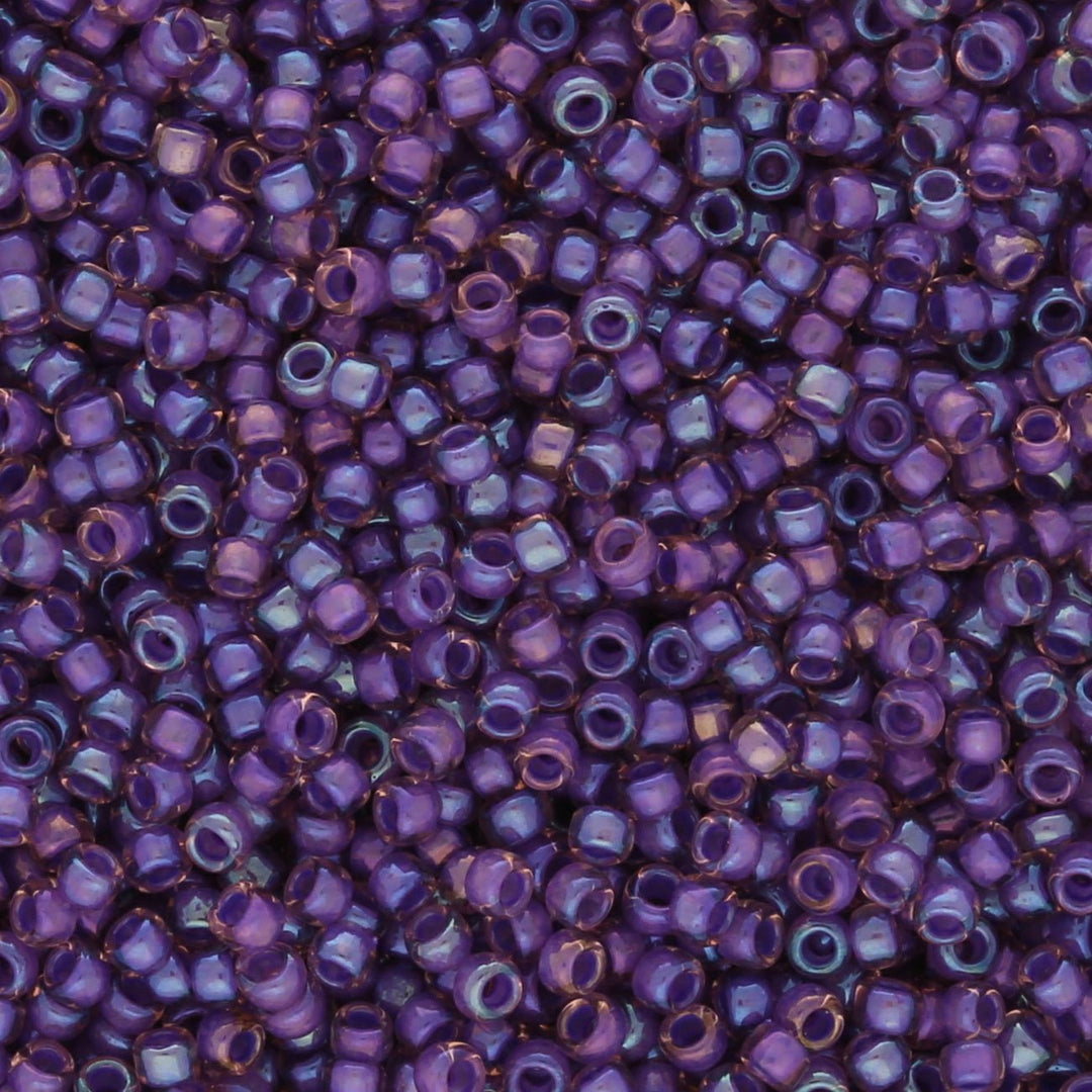 Rocailles-Perlen Toho 15/0 – Inside-Color Rainbow Rosaline/Opaque Purple Lined - PerlineBeads