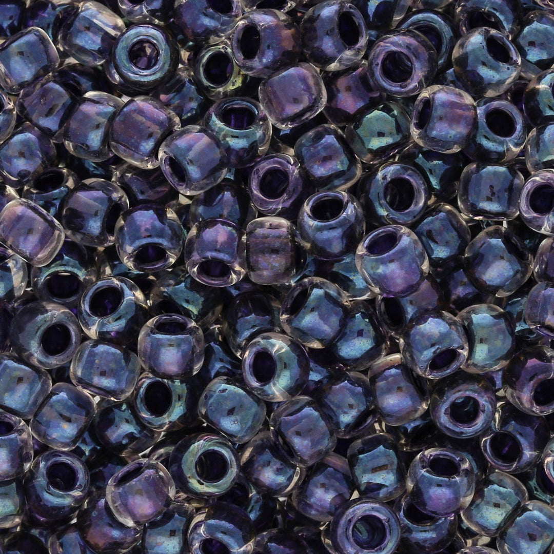 Rocailles-Perlen Toho 6/0 – Inside-Color Rainbow Crystal/Tanzanite-Lined - PerlineBeads