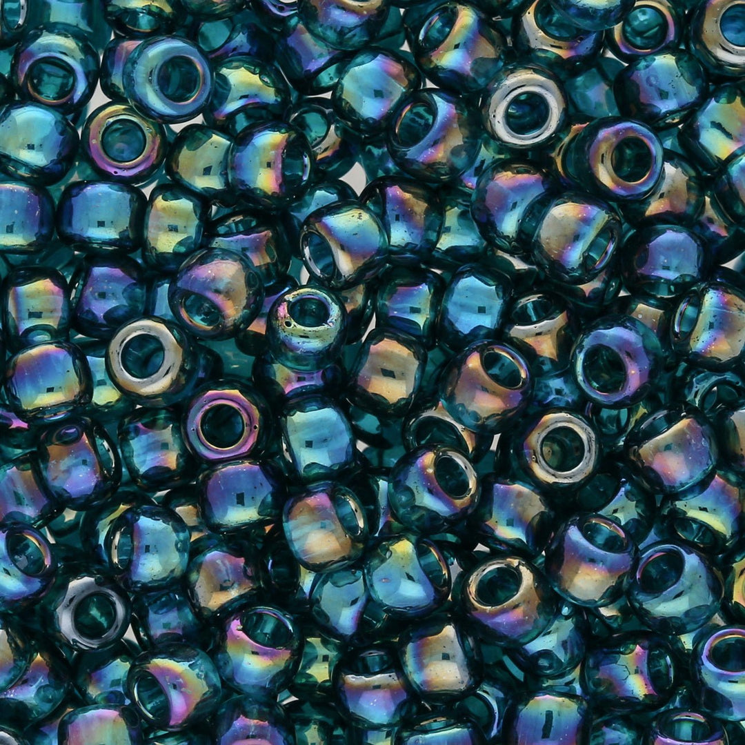 Rocailles-Perlen Toho 6/0 – Transparent-Rainbow Teal - PerlineBeads