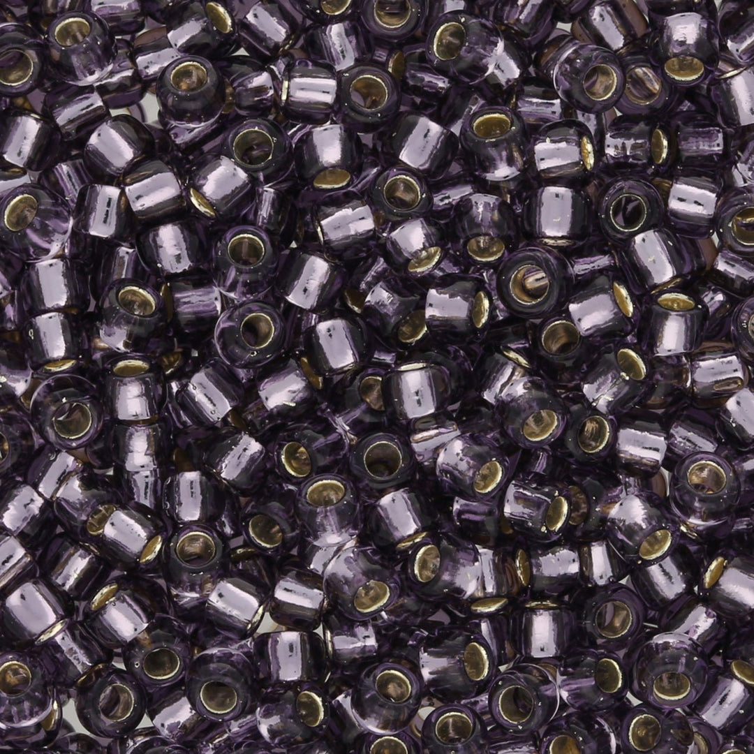 Rocailles-Perlen Toho 8/0 – Silver-Lined Tanzanite - PerlineBeads