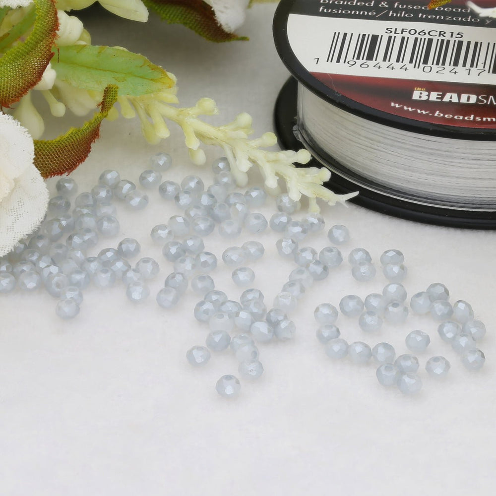 Rondellen aus facettiertem Glas 2x1,5 mm - Light Steel Blue - PerlineBeads